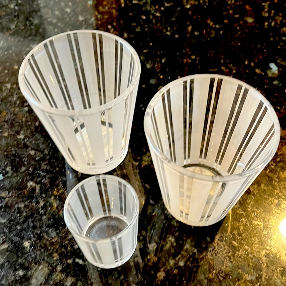 Three empty Nest candle jars.  Use as vases or refill with your own wax.